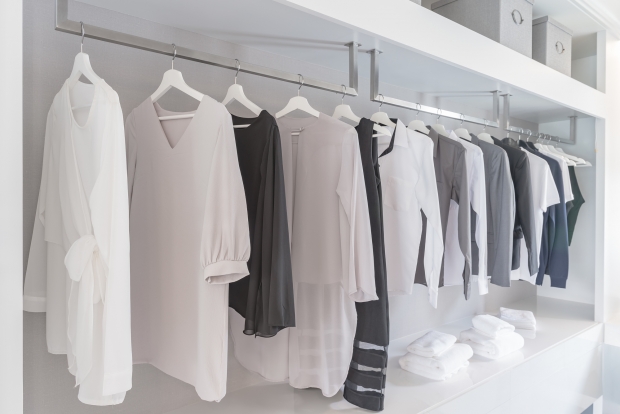 black and white color tone clothes in modern white wardrobe